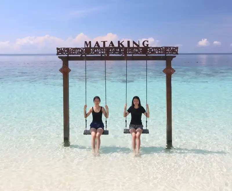 Exploring the sandbars of Mataking Island with Sand Bay Resort in the Semporna Islands area.