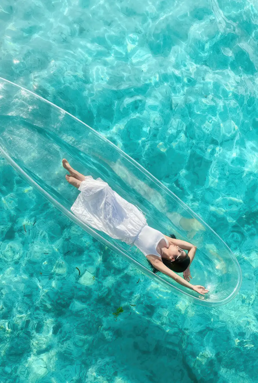 Guest enjoying a sea kayaking session in the lagoon Sand Bay Resort